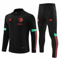 Манчестер Юнайтед детский спортивный костюм 2023-2024 чёрный с красным и бирюзовым